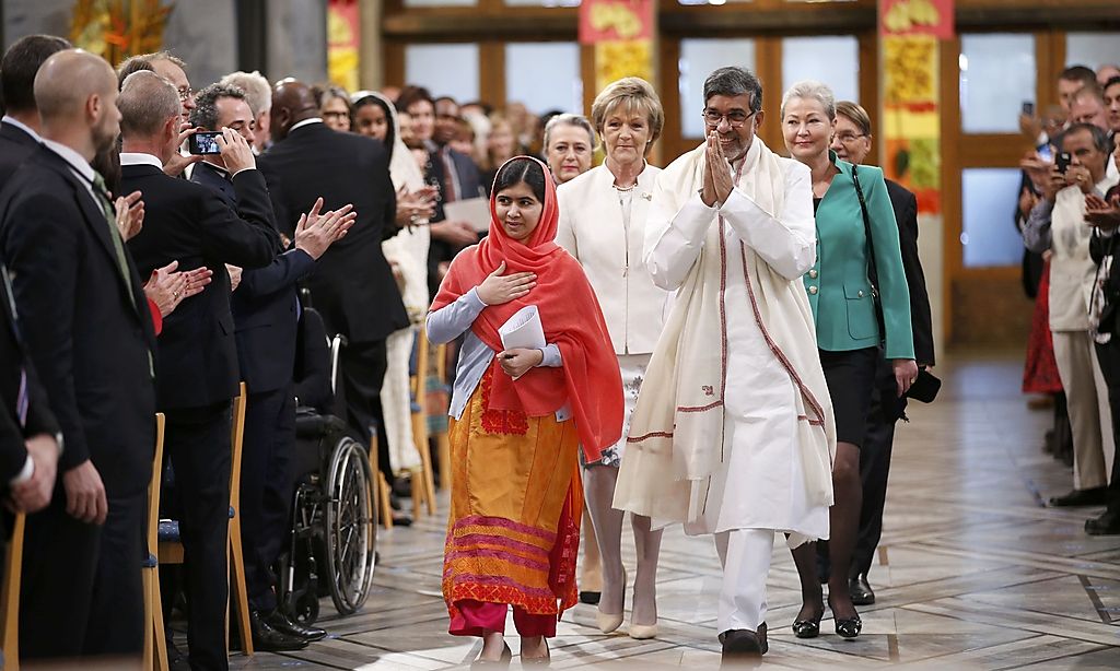 Nobel Peace Prize laureates Yousafzai and Satyarthi arrive for the Nobel Peace Prize awards ceremony at the City Hall in Oslo